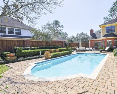 A private backyard retreat featuring a sparkling s