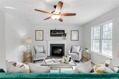 Great Room has Gas Log Fireplace w/Slate Surround 