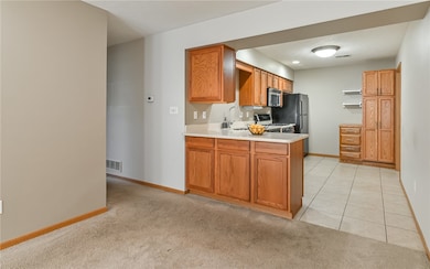 Dining area is open to kitchen.