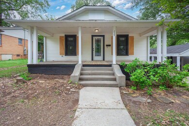 Bungalow featuring a porch
