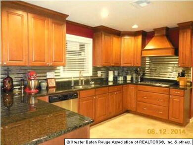 Gorgeous kitchen featuring galvanized backsplash a