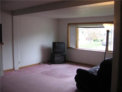 Living Room. 1st flor unit-has extended living roo