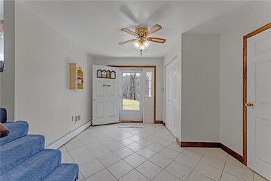 grand foyer with large storage closet, ceramic til