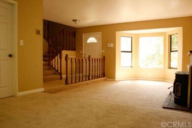 Another view of living/dining room showing front d