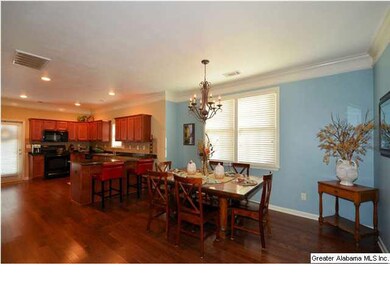 Gorgeous Dining area with gleaming hardwoods and n