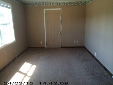 Living Room. Carpeted living room