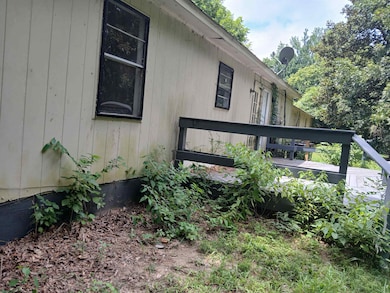 View of home's exterior with a deck