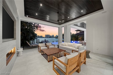 Patio terrace at dusk with an outdoor living space