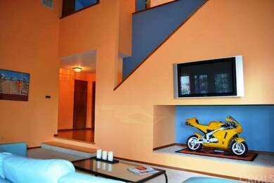 The entertainment area has an oversized niche, per