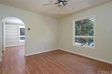 Enter the separate formal dining room from the den