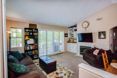 Living Room, note the custom wine cabinet in the c