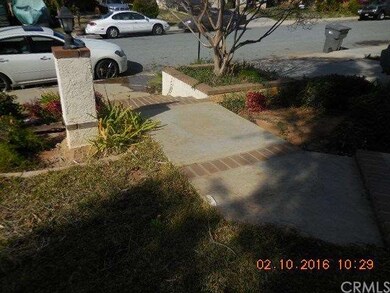 Lots of curb appeal with light pilaster, brick inl