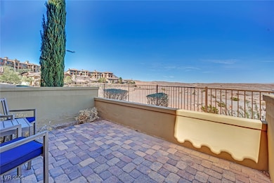 View of patio with fence
