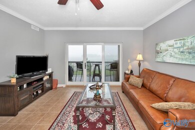 Tile flooring, Crown molding, ceiling fan, 9' ceiling, wet bar with ice maker