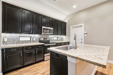 Pretty granite, under counter lighting. The door o