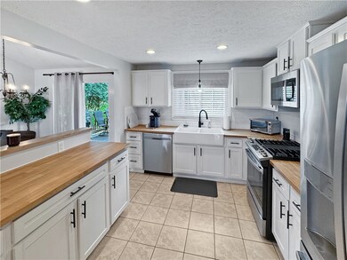 Extra counter space, ceramic tile floor.