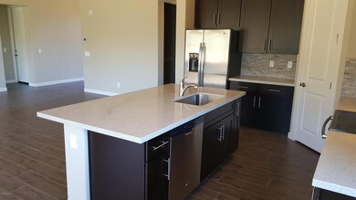 Large Kitchen Island with Slab Granite