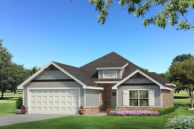 Craftsman-style home featuring a garage, a front yard, concrete driveway, and brick siding
