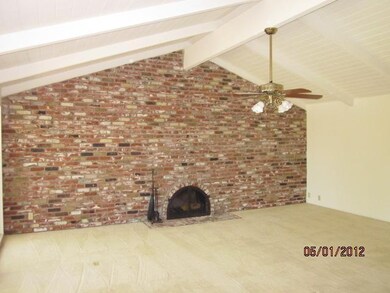 Beautiful full brick fireplace wall in living room