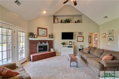 Family Room Features Wood Burning FirePlace, Built