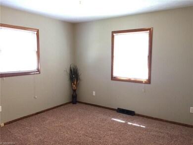 The master bedroom has an attached half bath.