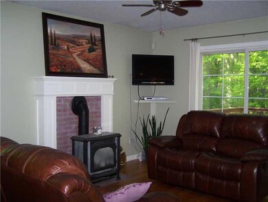 Living Room. Living room with gas stove.