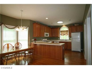 Kitchen - Wood floors, open concept very spacious