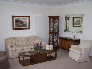 2nd view of living room oak floor under carpet