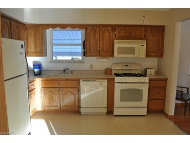 Spacious kitchen - wallpaper recently removed and 