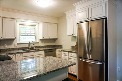 KITCHEN W/ BRAND NEW GRANITE COUNTER TOPS & STAINL