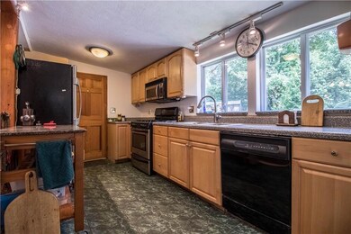Kitchen with ample cabinet and...