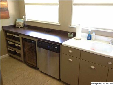Stainless dishwasher and smooth surface cooktop.