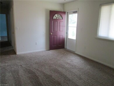 Living room looking to front door