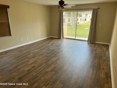 Living/dining area leading to rear patio