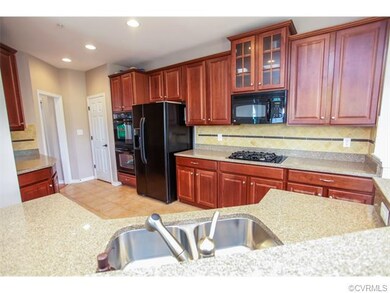 This kitchen has plenty of cabinets and counter sp