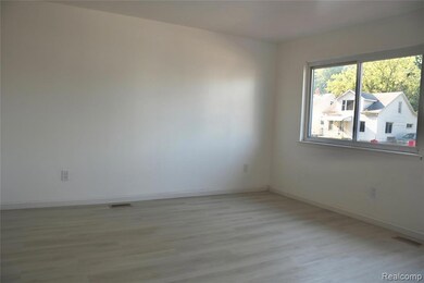 Empty room featuring light wood-style floors