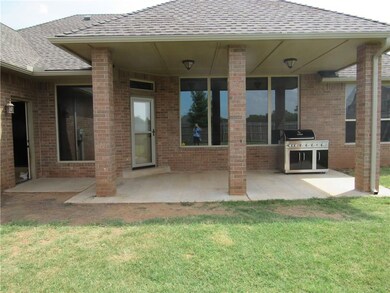 Bring on the Barbeque!  This covered back patio co