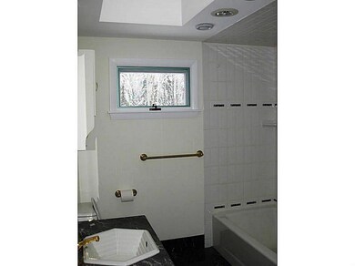 Bathroom. Updated full bath beside...