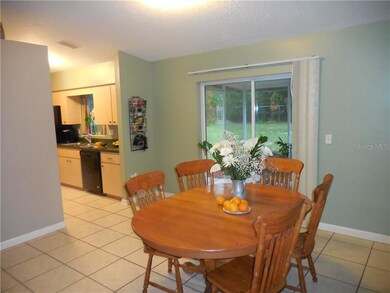 looking in to kitchen from dining room with view o