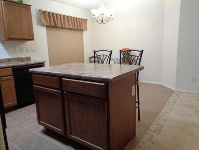 KITCHEN ISLAND & DINING AREA