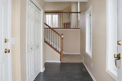 Foyer and Stairs to Living Room