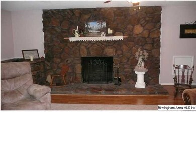 Stone Wood Burning Fireplace in Living Area