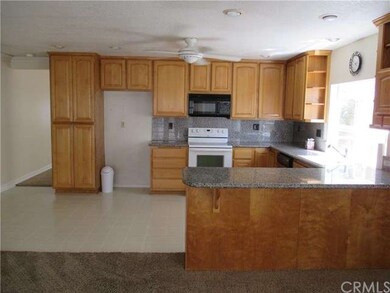 Kitchen from family room.  Pantry on the left has 