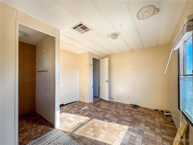 Empty room featuring parquet floors