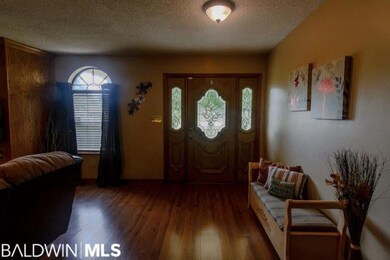 View of Front door with side lites