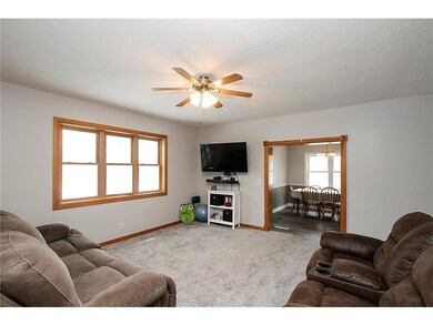 Living room. Hardwood floors under carpet on the m