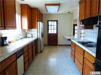 Great kitchen with oak cabinets.