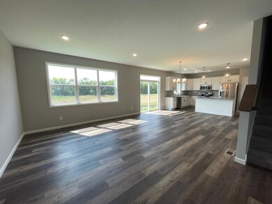 All photos of previously finished home of same floor plan -Main Level Open Floor plan with luxury vinyl plank flooring throughout the main level.