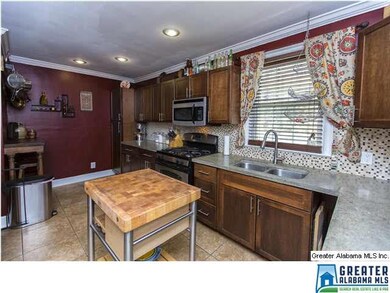 Cozy Kitchen with Mosaic Tile Backsplash, Tile Flo
