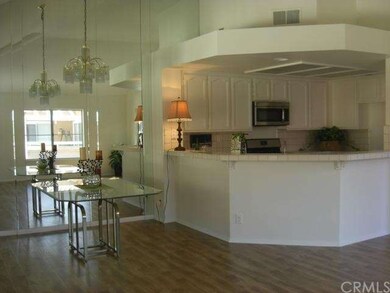 Floor to ceiling mirrored wall  makes unit feel tw
